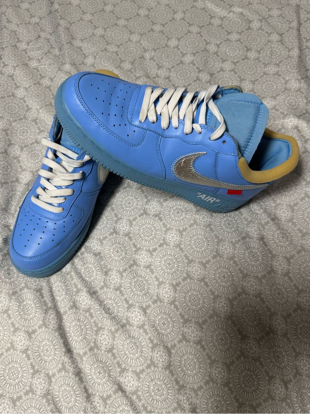 Blue Low-Top Sneakers with Silver Swoosh